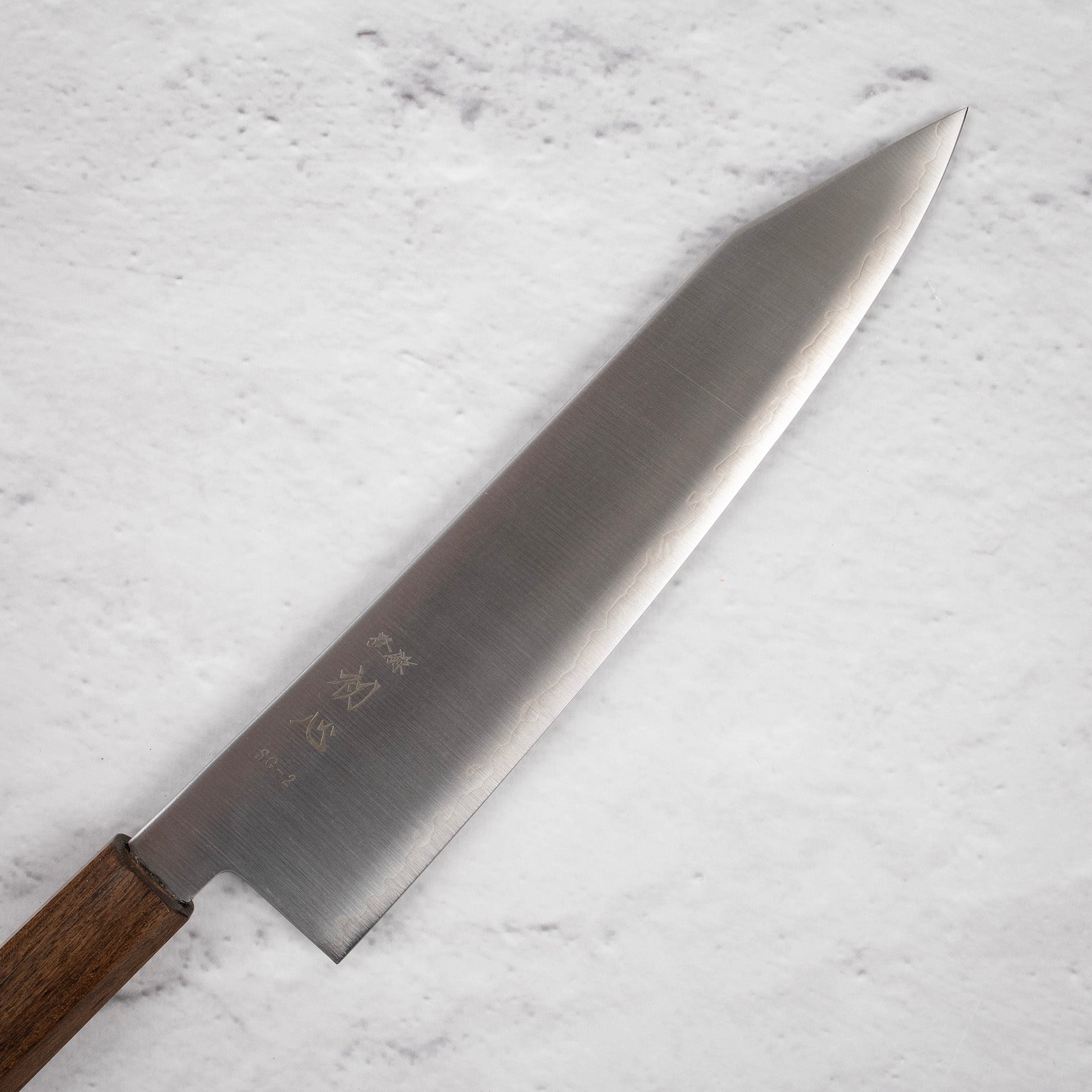 HatsukokoroHayabusaSG2MigakiK-tipGyuto210mmb.jpg Hatsukokoro Hayabusa SG2 Migaki K-tip Gyuto 210mm, view 2