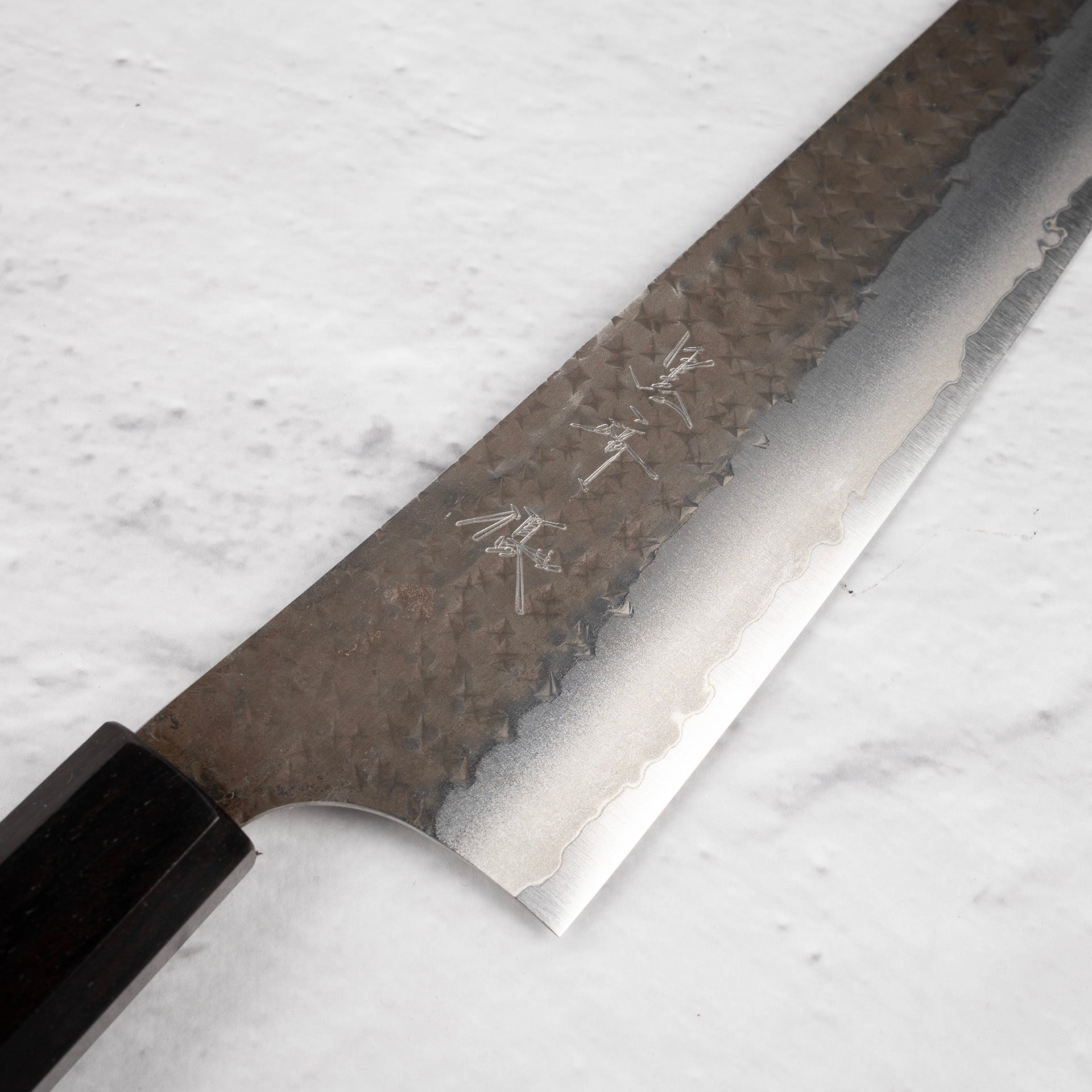 KurosakiKokuseneiAogamiSuperKtipBunka170mmEbonyHandlec_9c34085d-c947-4495-9772-907fd3974543.jpg Kurosaki Kokusen Ei Aogami Super K tip Gyuto 210mm Ebony Handle, view 3