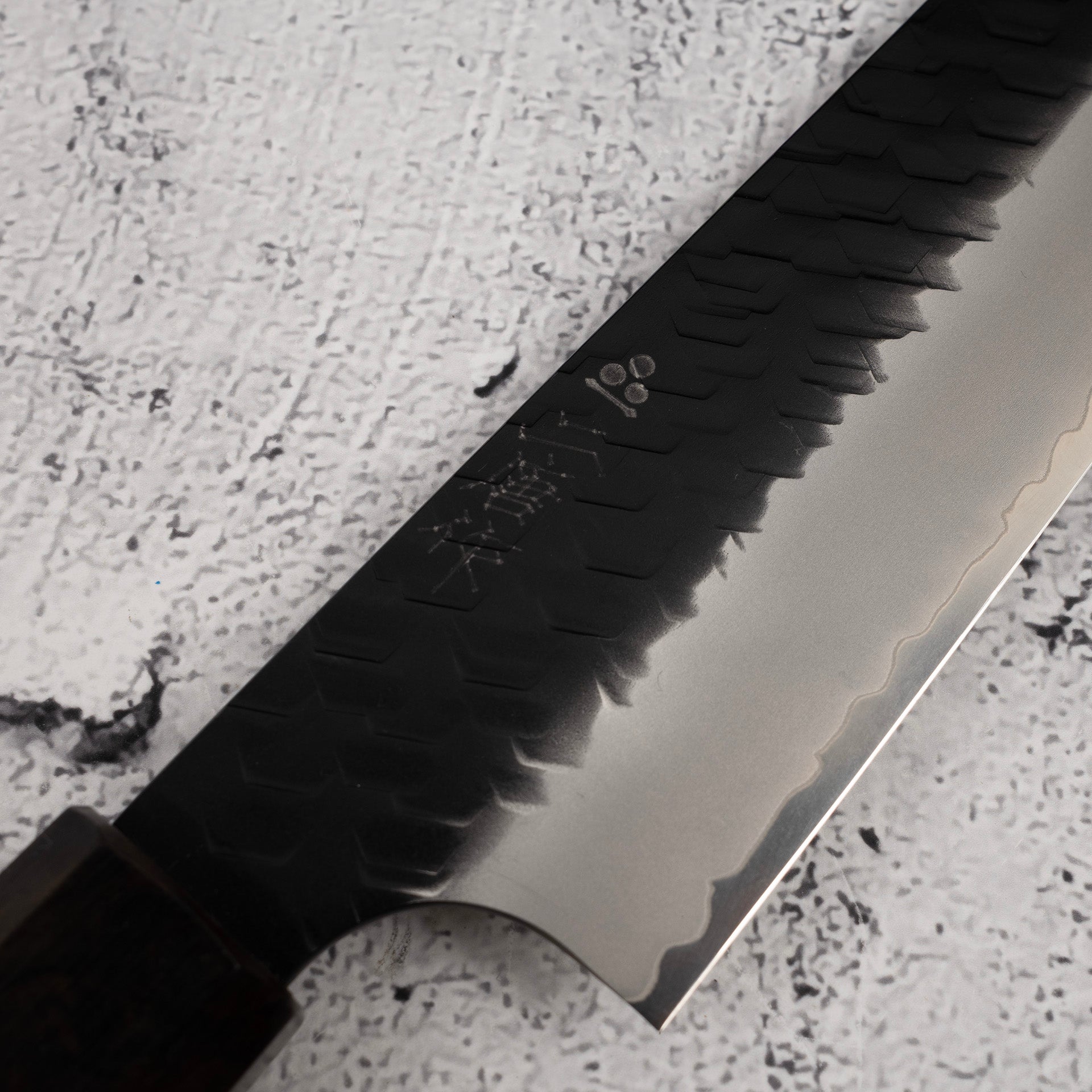 NigaraSG2KurouchiTsuchimeSujihiki240mmEbonyHandlec.jpg Nigara SG2 Kurouchi Tsuchime Sujihiki 240mm Ebony Handle, view 3