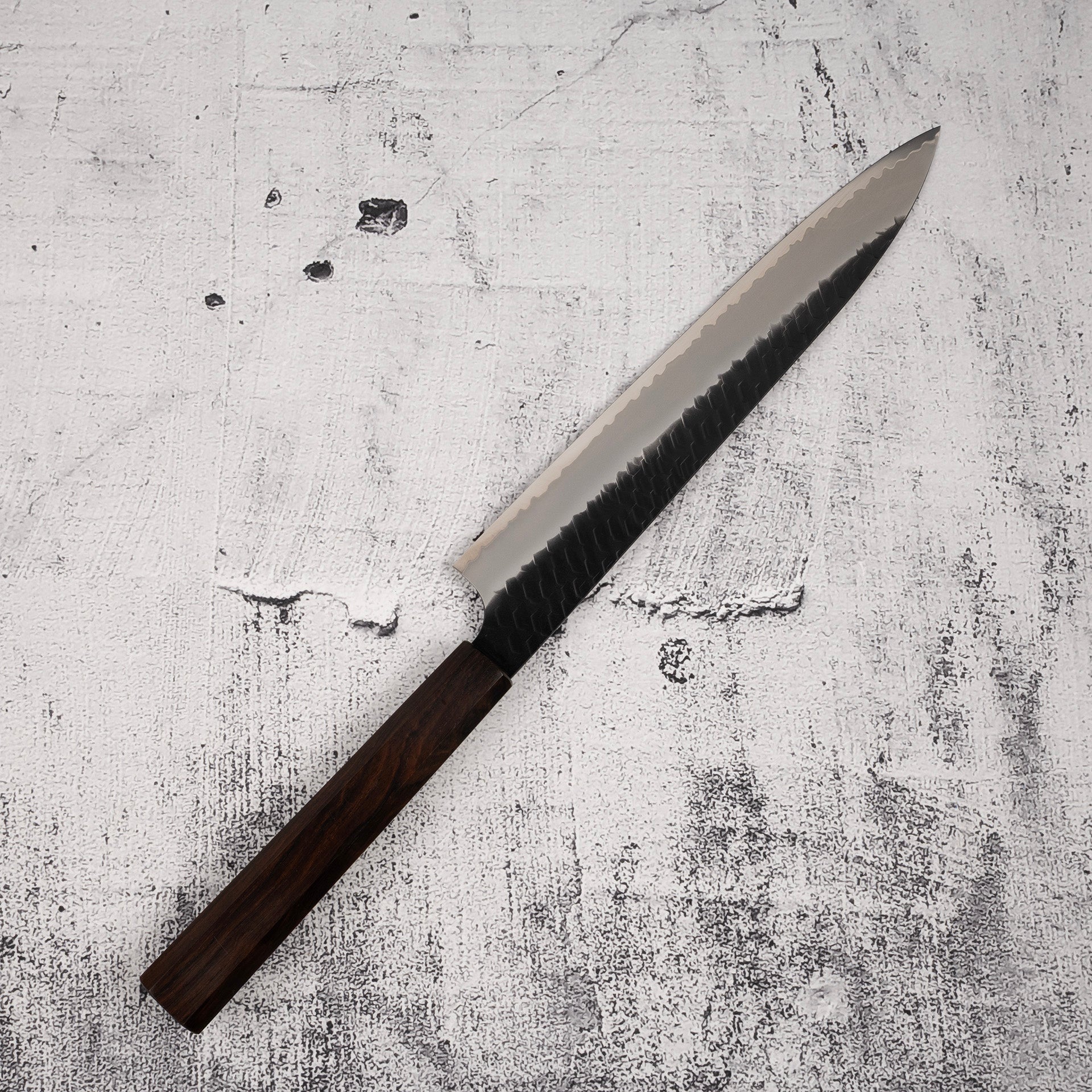 NigaraSG2KurouchiTsuchimeSujihiki240mmEbonyHandlef.jpg Nigara SG2 Kurouchi Tsuchime Sujihiki 240mm Ebony Handle, view 5