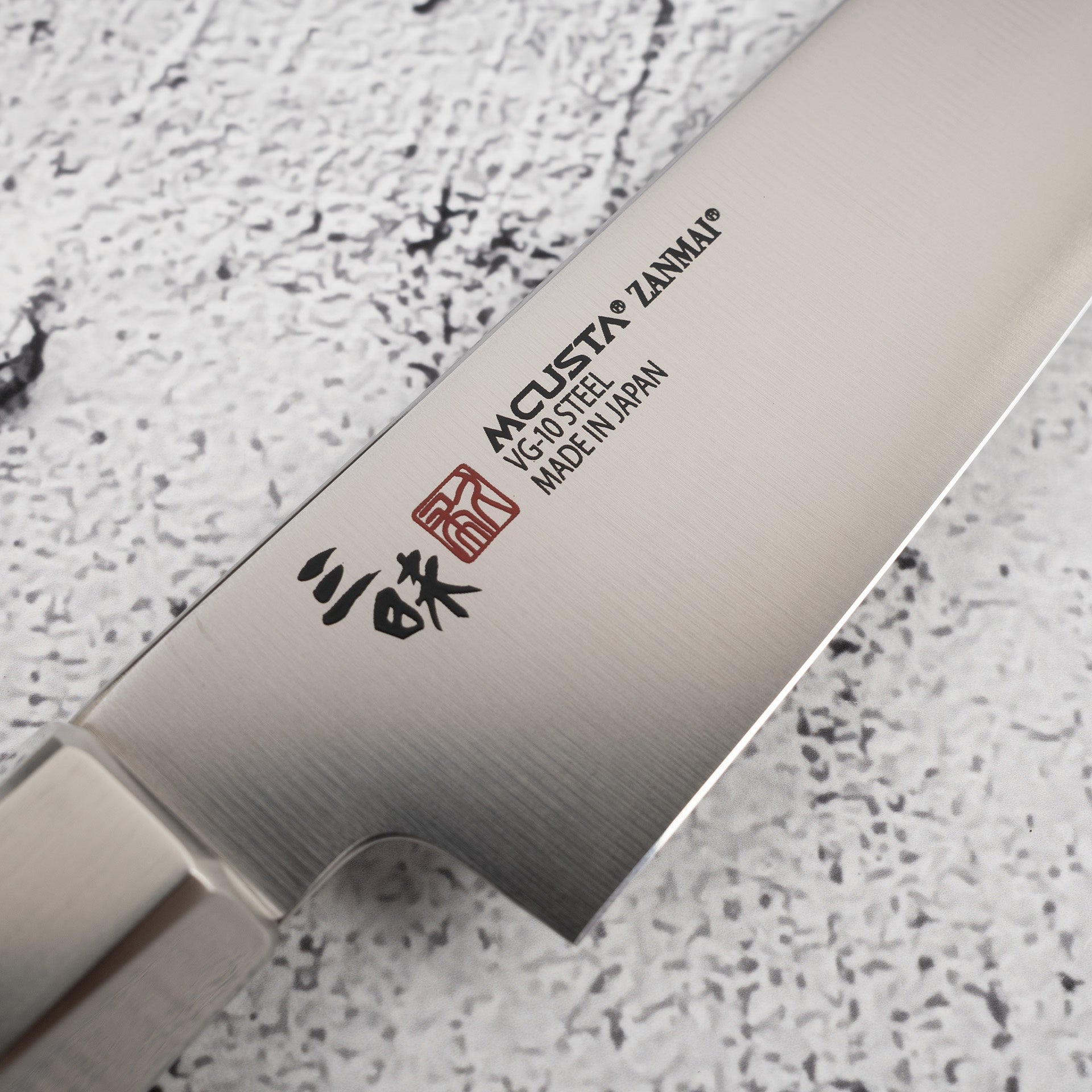 SanmaiHybridVPetty150mm-20250801-11.jpg Mcusta Zanmai Hybrid VG10 Petty 150mm, view 4