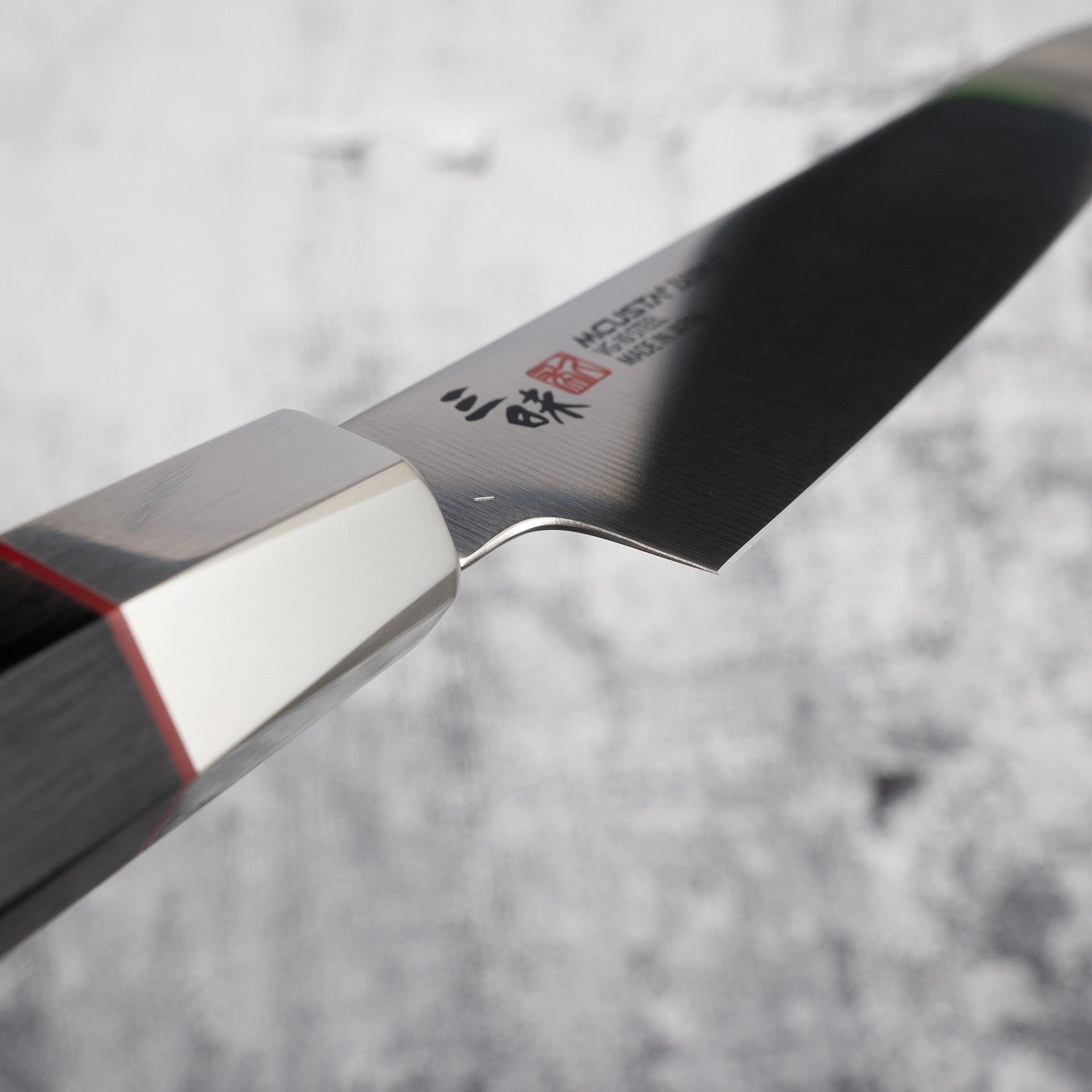 SanmaiHybridVPetty150mm-20250801-14.jpg Mcusta Zanmai Hybrid VG10 Petty 150mm, view 3
