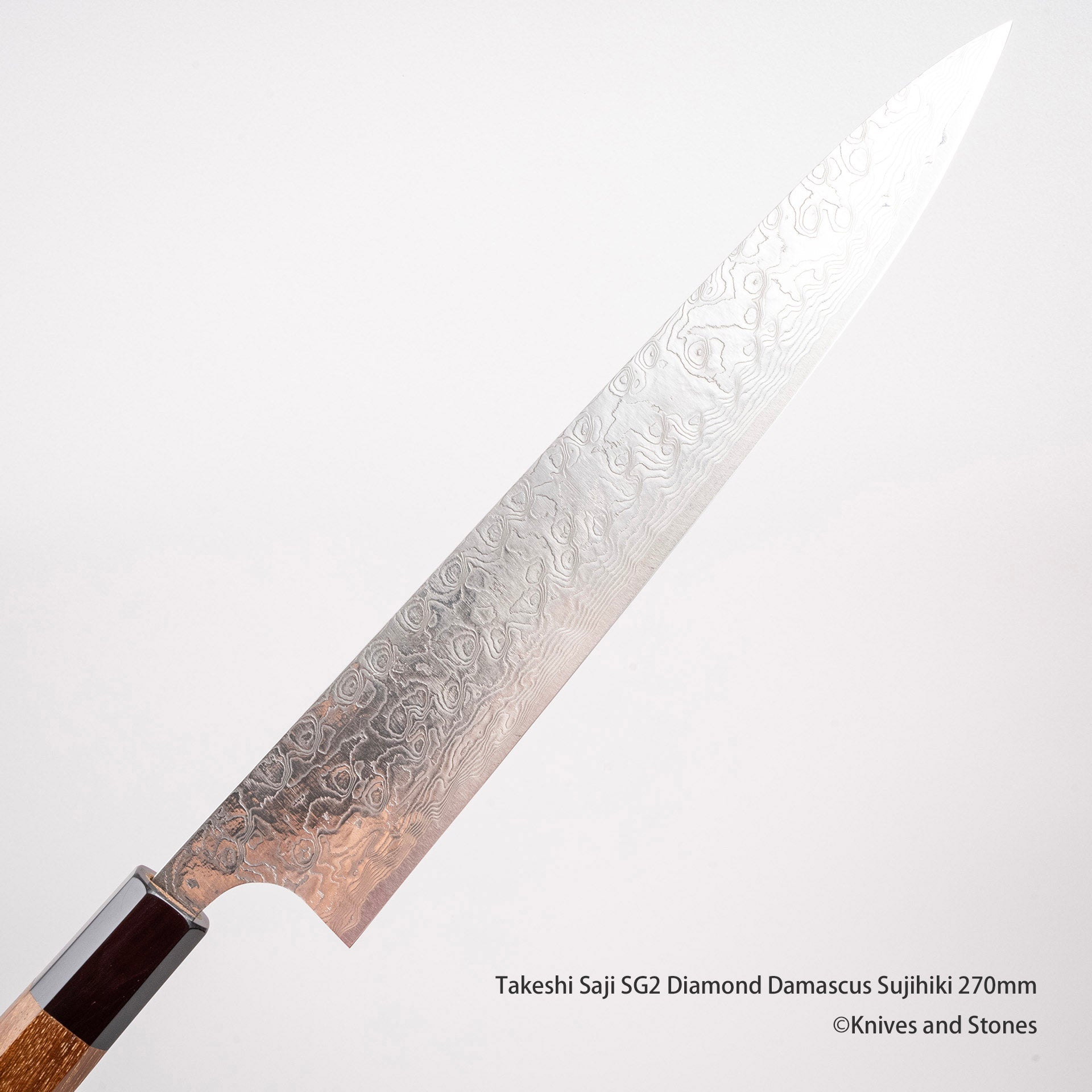 TakeshiSajiSG2DiamondDamascusSujihiki270mmL.jpg Takeshi Saji SG2 Diamond Damascus Sujihiki 270mm, view 2