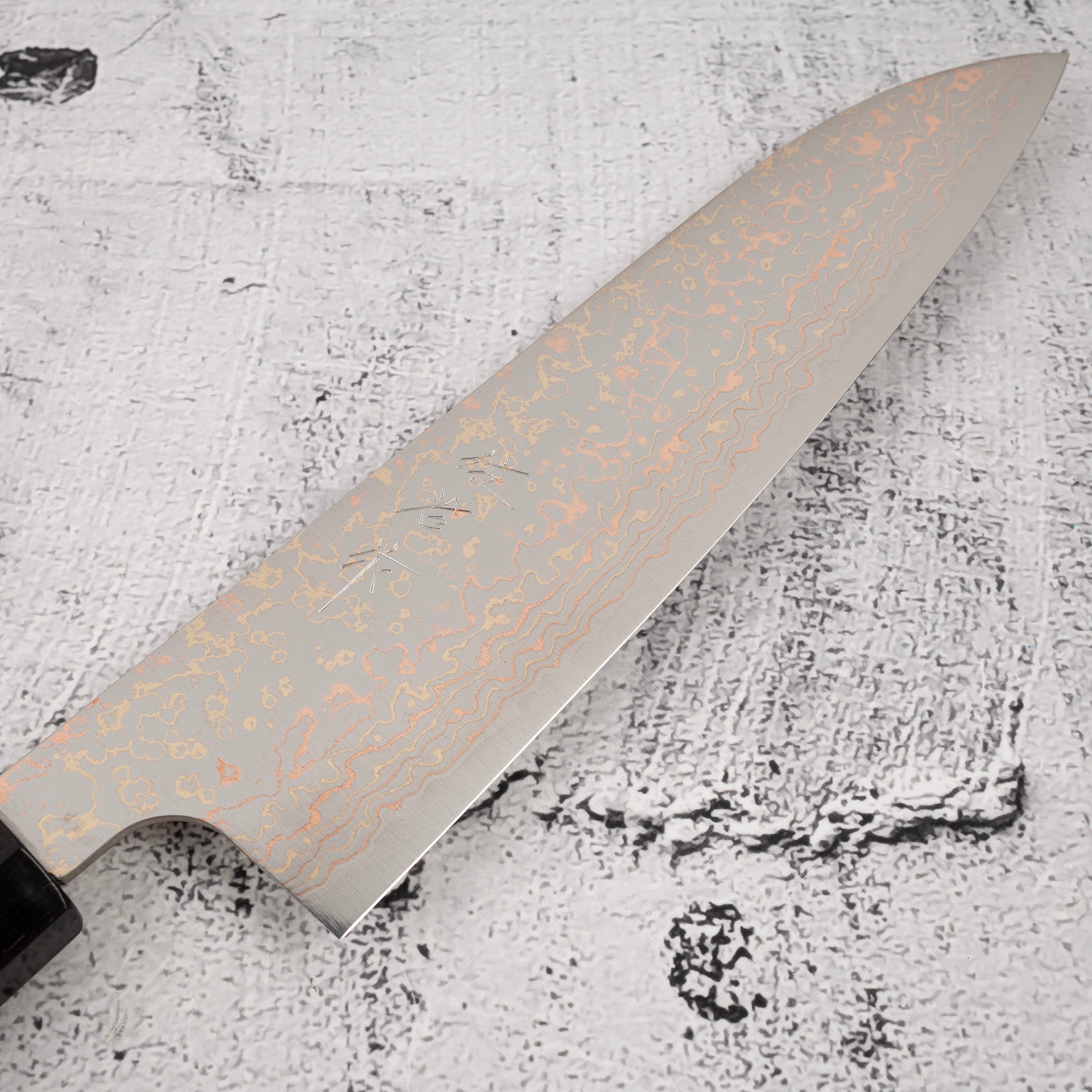 TakeshiSajiVG10RainbowDamascusGyuto180mmEbonyHandleMosaicPinb.jpg Takeshi Saji VG10 Rainbow Damascus Gyuto 180mm Ebony Handle Mosaic Pin, view 4