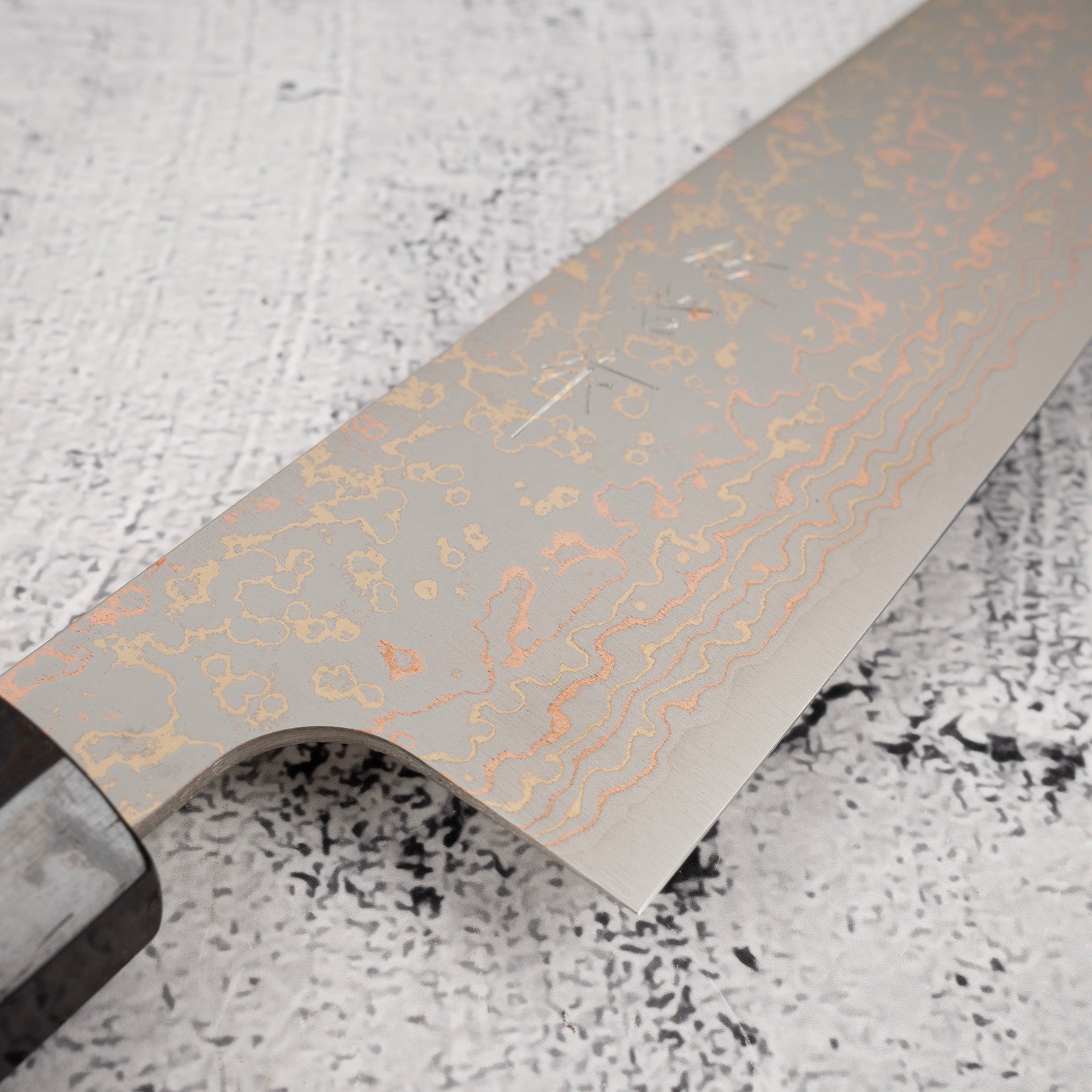 TakeshiSajiVG10RainbowDamascusGyuto180mmEbonyHandleMosaicPinc.jpg Takeshi Saji VG10 Rainbow Damascus Gyuto 180mm Ebony Handle Mosaic Pin, view 5