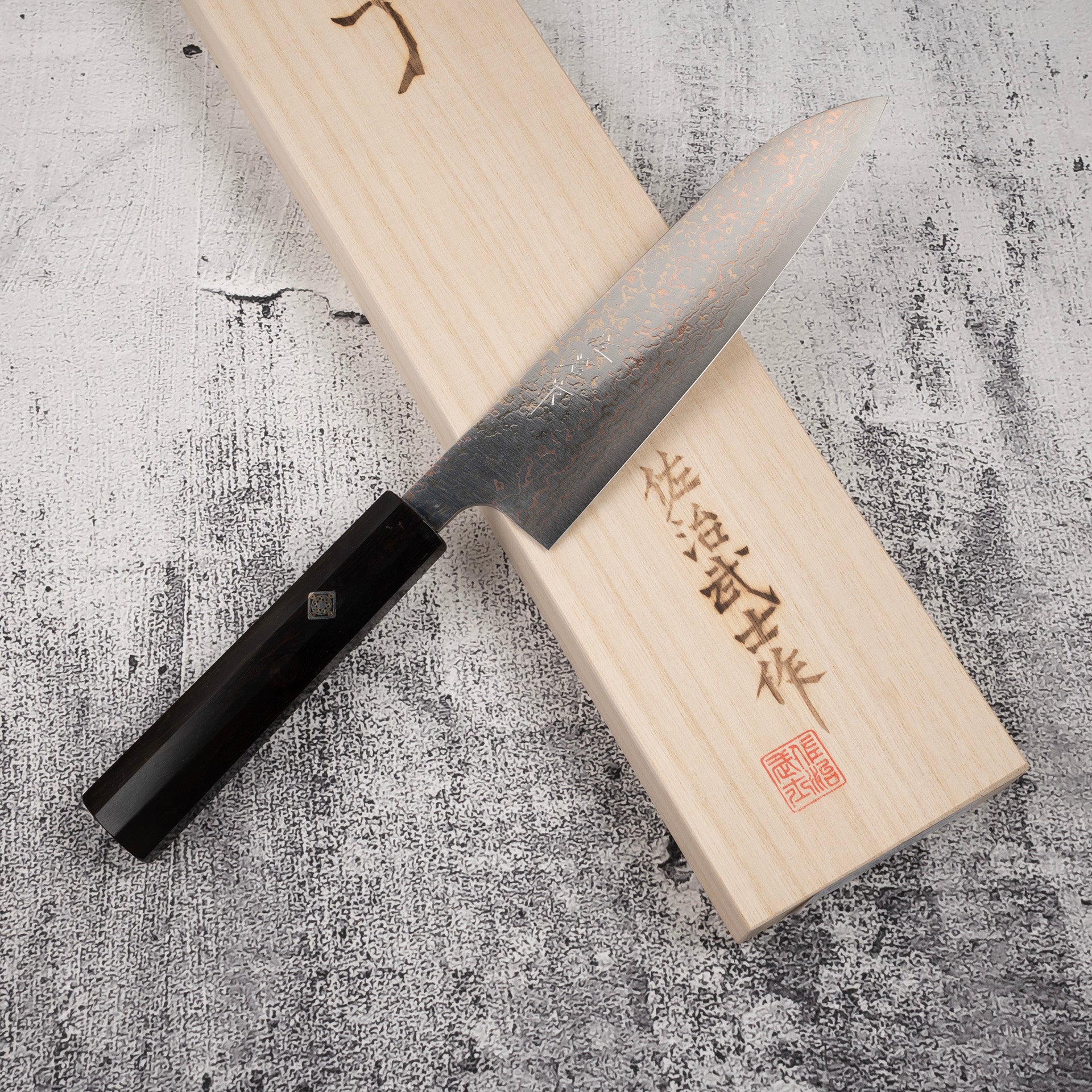 TakeshiSajiVG10RainbowDamascusGyuto180mmEbonyHandleMosaicPinj.jpg Takeshi Saji VG10 Rainbow Damascus Gyuto 180mm Ebony Handle Mosaic Pin, view 2