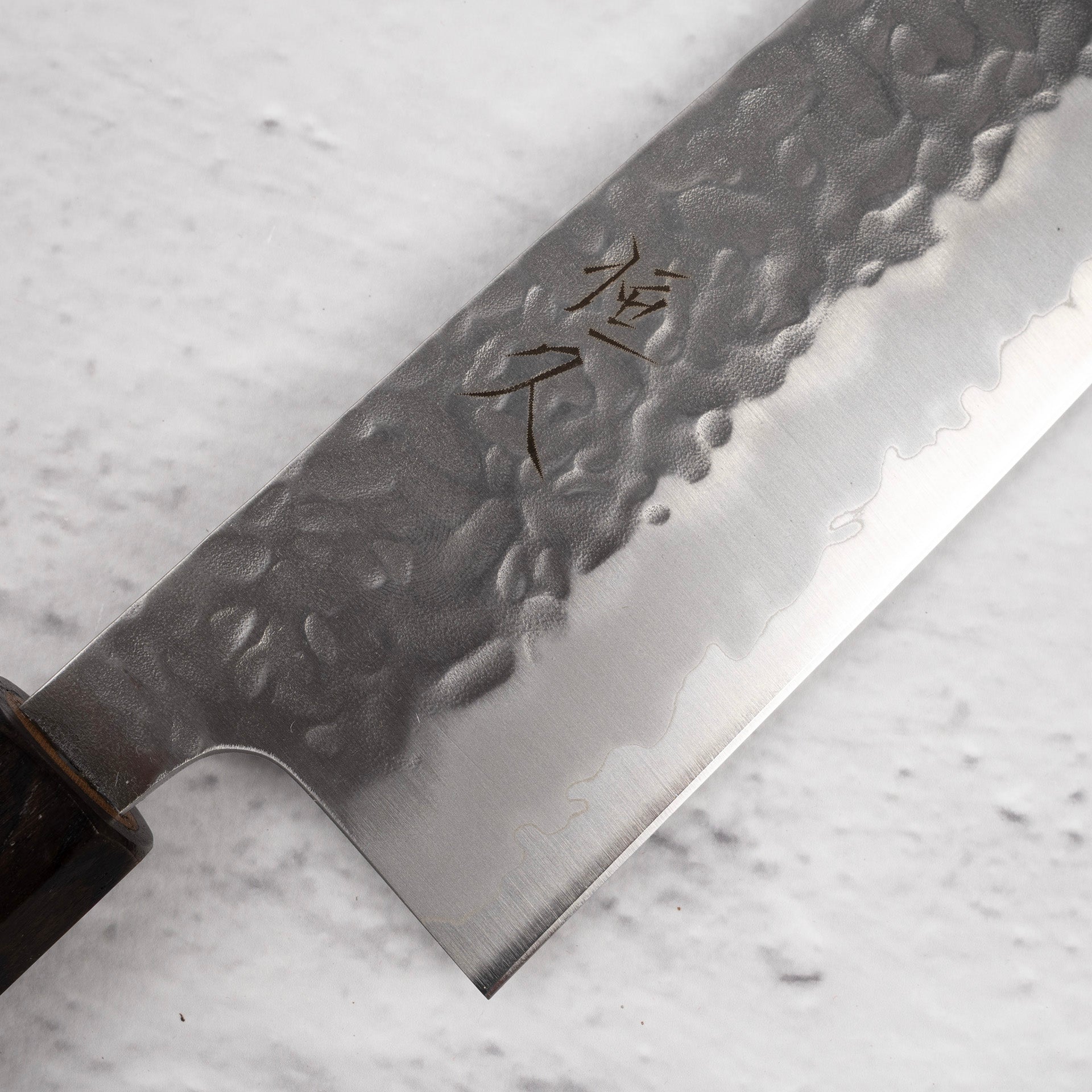 TsunehiraWhite2TsuchimeGyuto240mmEbonyHandlec.jpg Tsunehisa White 1 Stainless Clad Tsuchime Gyuto 240 mm Ebony Handle, view 3